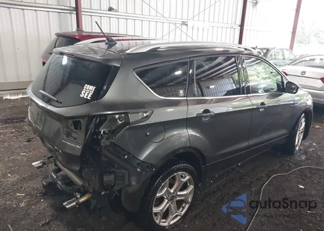 2018 Ford Escape Titanium z USA, uszkodzony, nr VIN 1FMCU9J98JUA07433